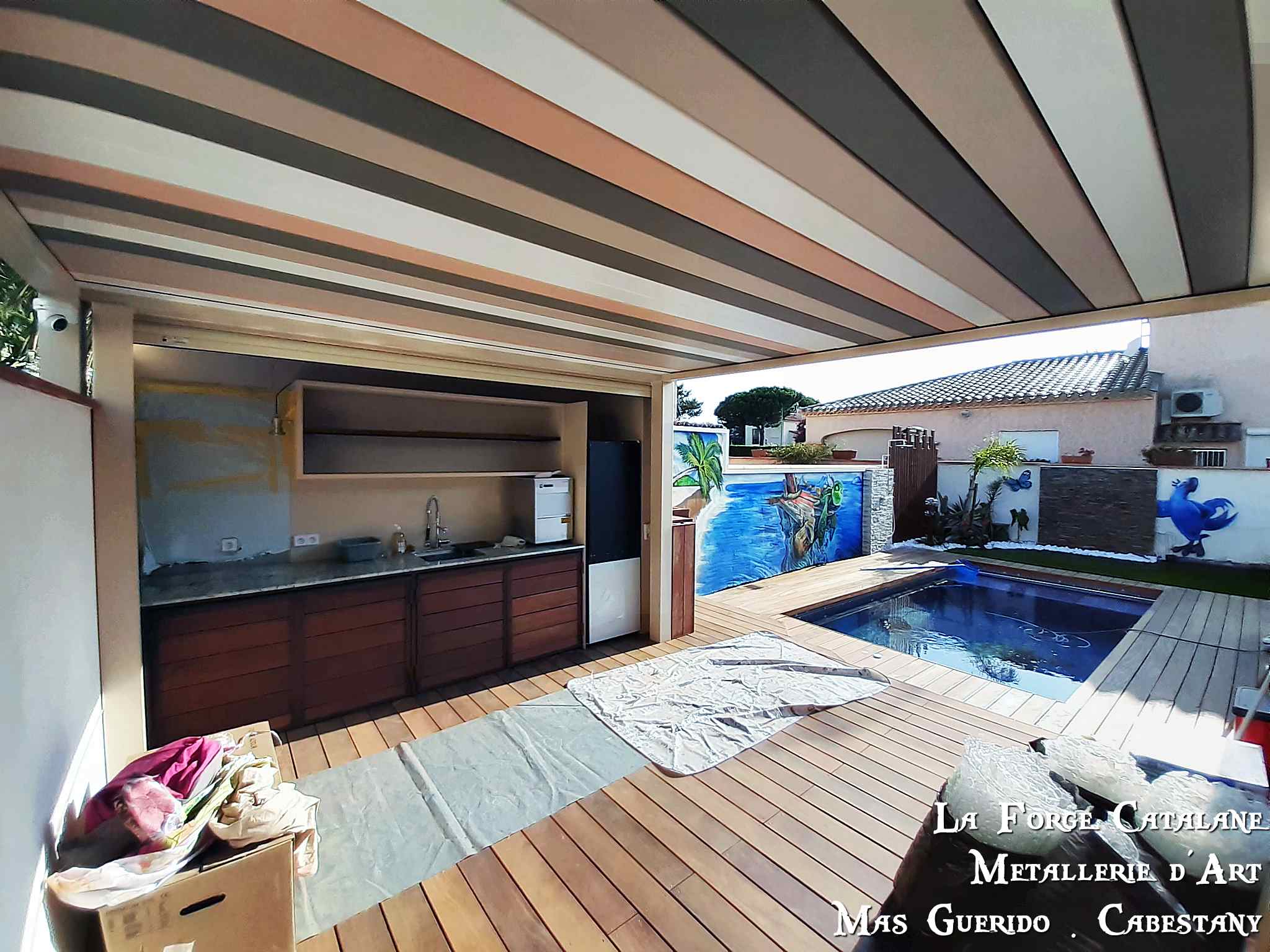 cuisine ete en fer plaque bois exotique forge catalane.jpg